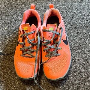 Nike Kids Bright Orange Athletic Sneakers with Black Swoosh
